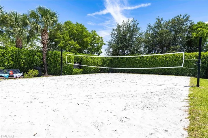 View of property's community featuring volleyball court