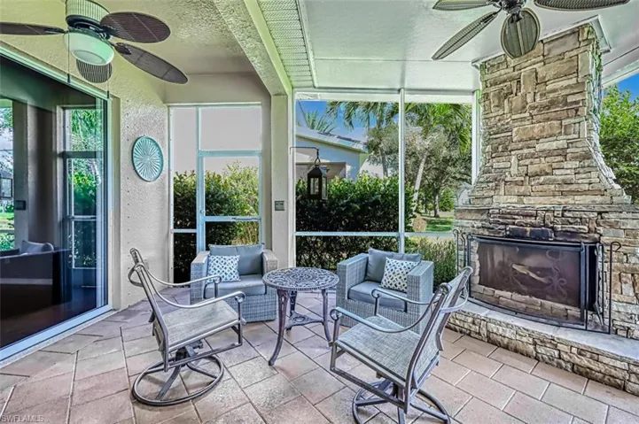 Sunroom with ceiling fan and healthy amount of natural light