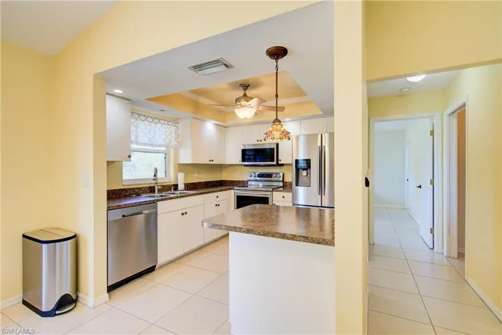The centrally located kitchen is super convenient