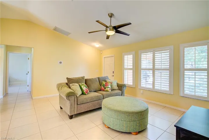 A substantial living room as you enter, at 16' x 14'