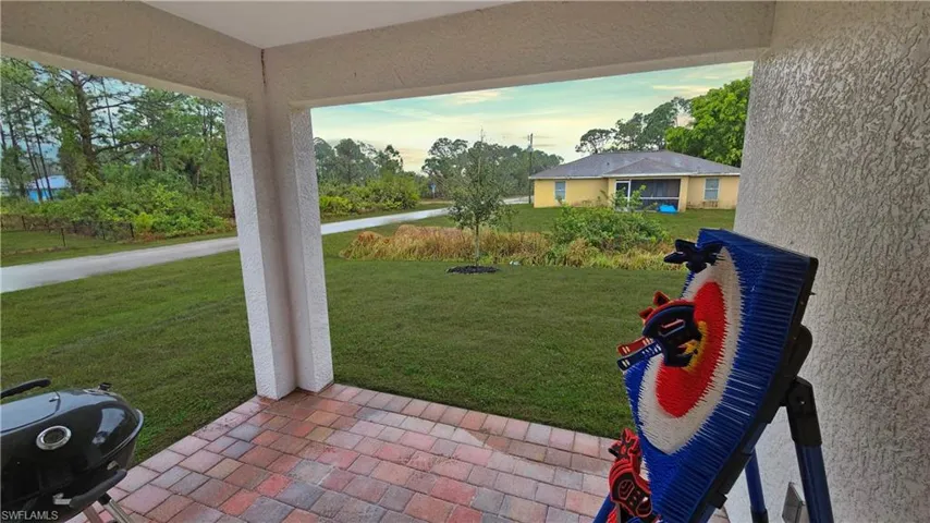 View of yard featuring a patio
