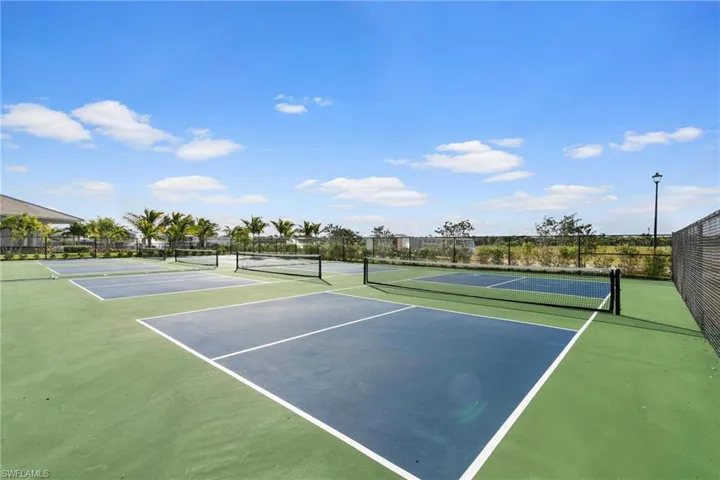View of sport court with community basketball court and fence