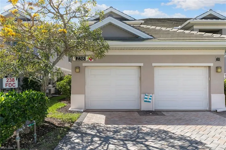 Garage with decorative driveway