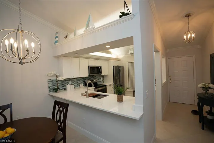 modern light fixtures-entry door on right