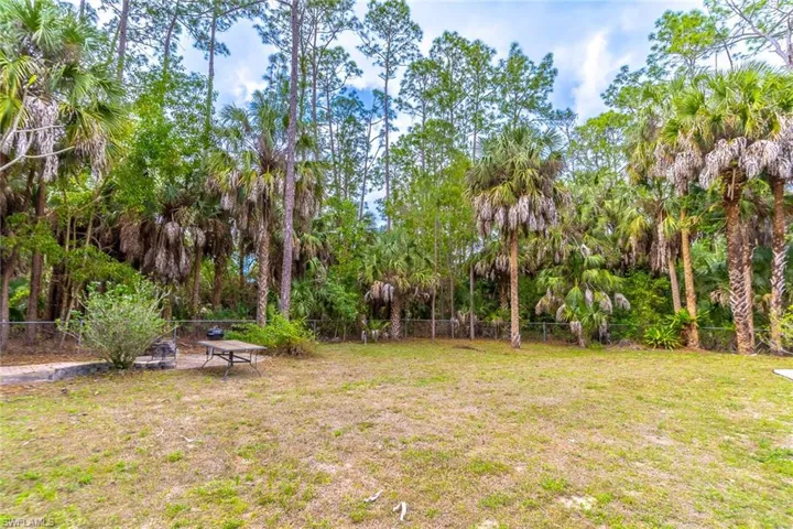 View of fenced backyard