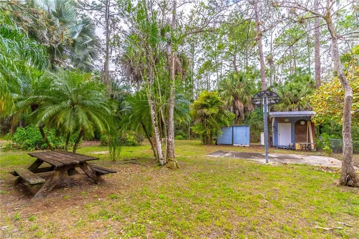 View of yard with storage area