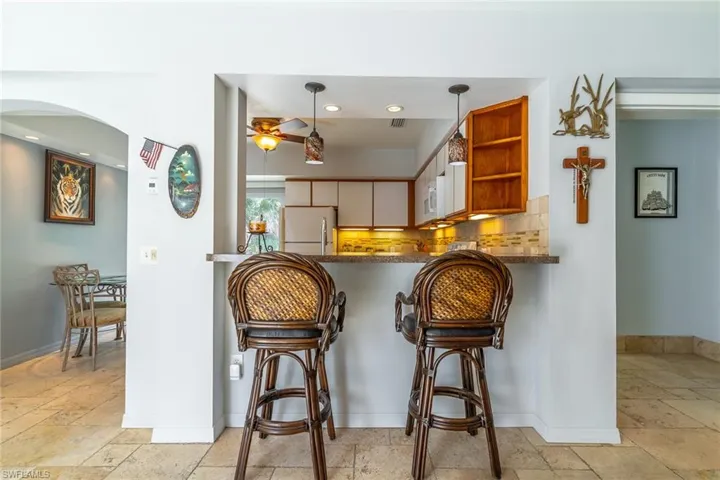 Kitchen Bar area with stone tile flooring
