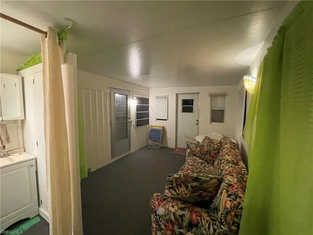 Sitting room with carpet floors