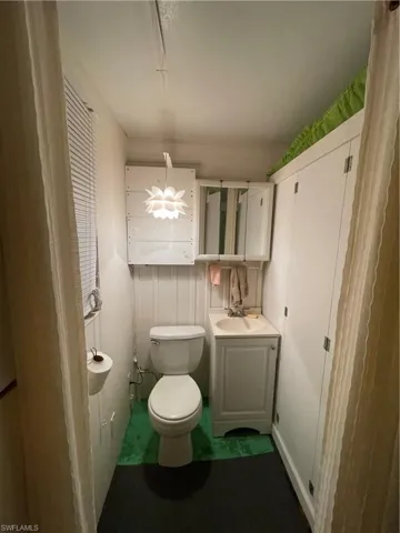 Bathroom featuring toilet and vanity