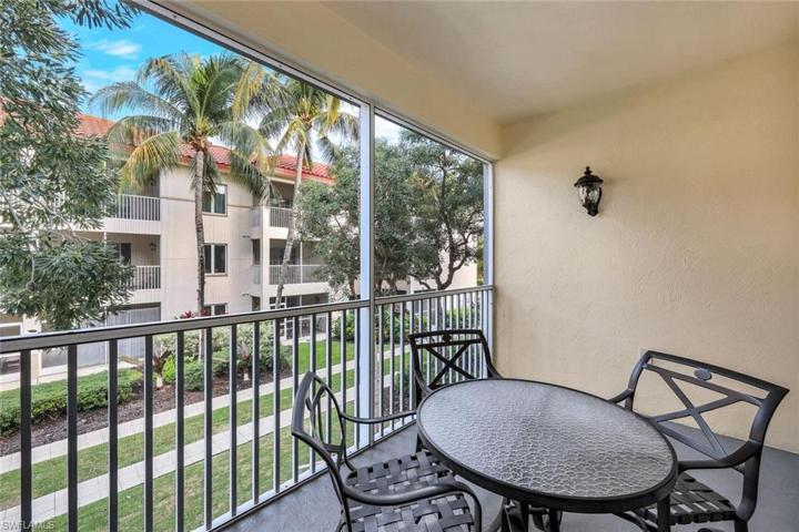 Enjoy morning coffee on your private balcony overlooking the courtyard