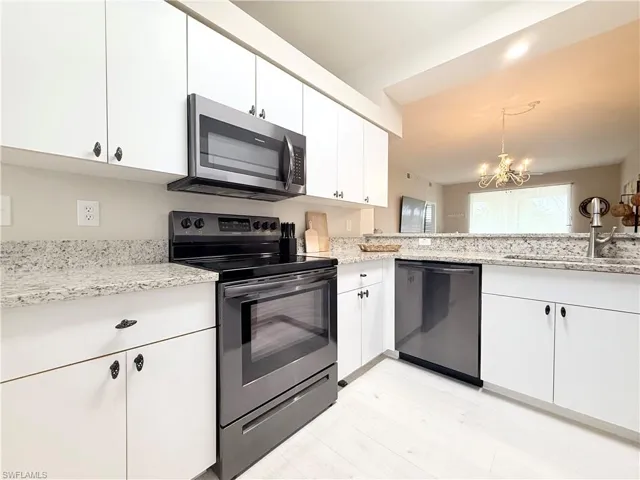 Newer appliance and grantie country tops