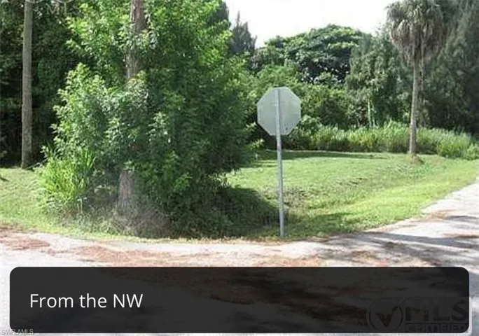 View of road featuring traffic signs