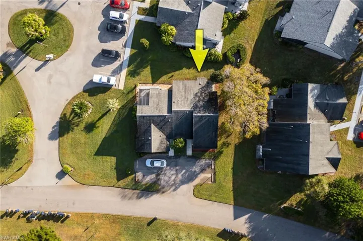 Aerial overview of property's location with nearby suburban area