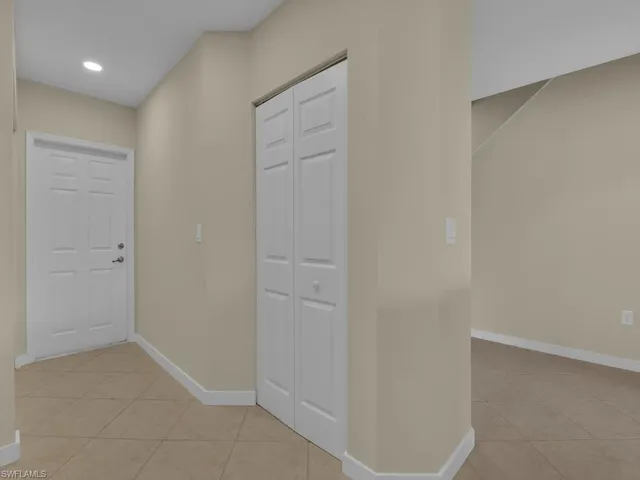 Door to garage and pantry door