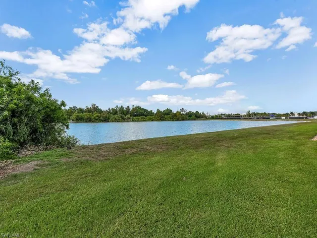 Spectacular and expansive lake view, captured from the rear of the property, showcasing the serene natural beauty.
