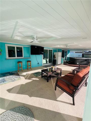 Updated pool lania area with hot tub