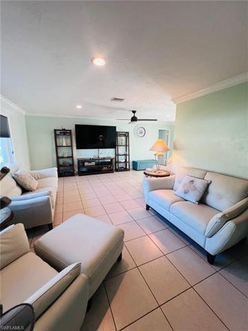 Tile living room with leather furniture