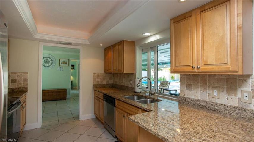 Updated granite and stainless steel appliance.