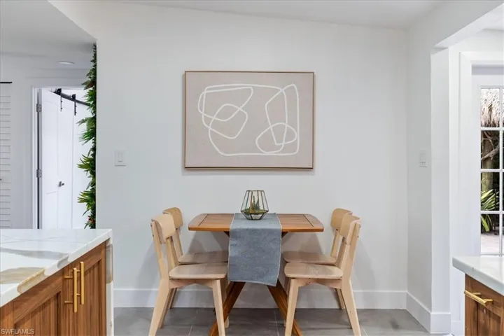 Dining area featuring a healthy amount of sunlight