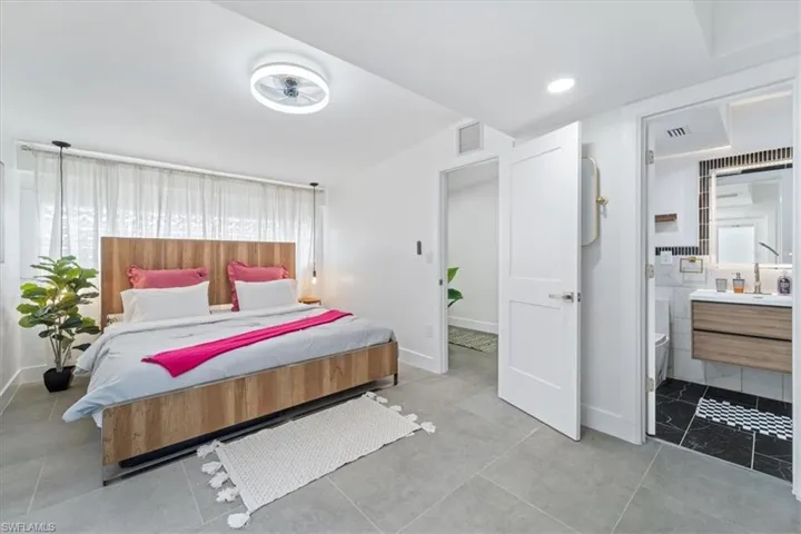 Bedroom featuring ensuite bathroom