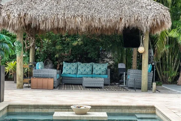 View of swimming pool with outdoor lounge area and a patio area