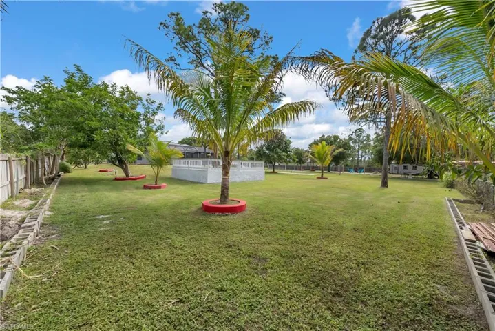 View of fenced backyard