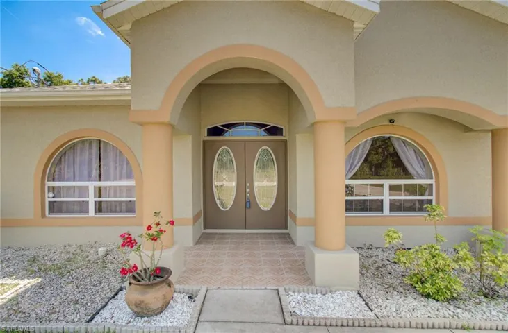 Doorway to property with french doors