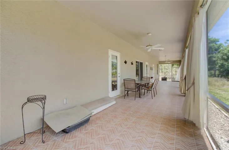 Sunroom with ceiling fan