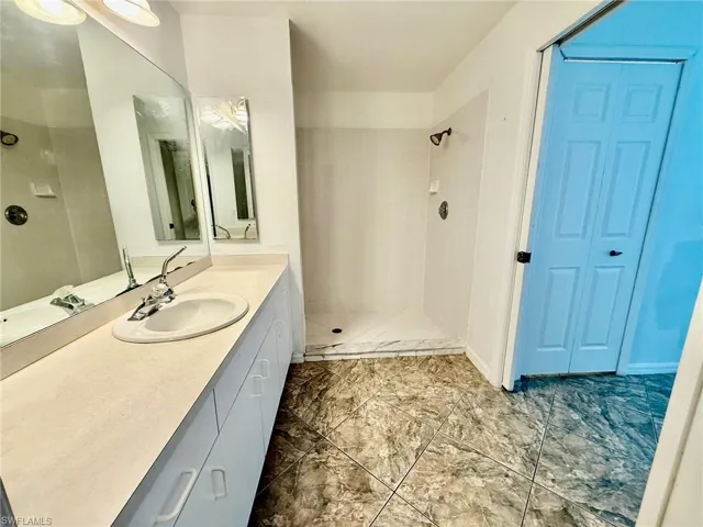 Hallway featuring baseboards