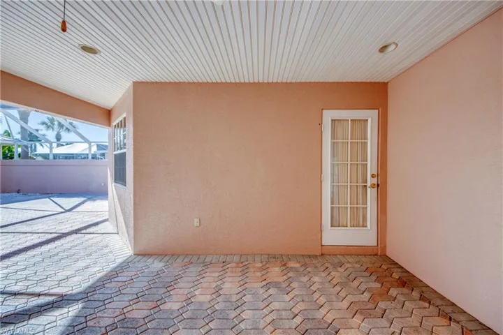 Guest Cabana entry from Courtyard. Under central AC with main home. Bedroom suite has en-suite bathroom with door to courtyard and walk-in shower. there is a walk-in closet and a kitchenette area.