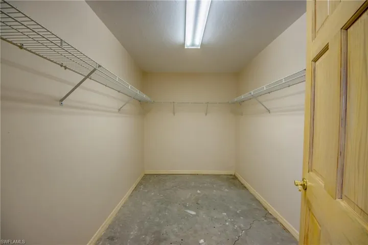 Primary Suite is spacious enough for a sitting area and features a huge walk-in closet and an en-suite bathroom.