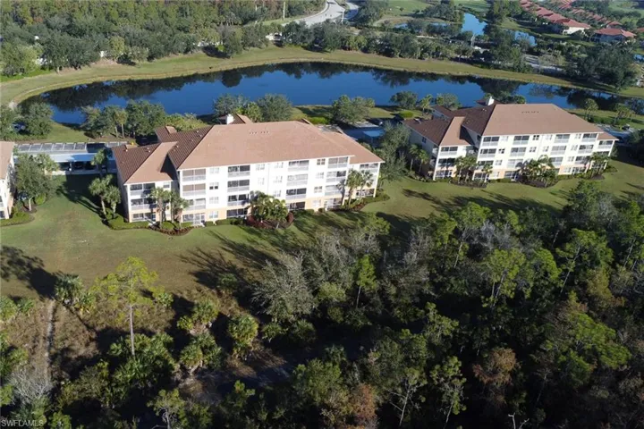 Aerial overview of property's location featuring a nearby body of water