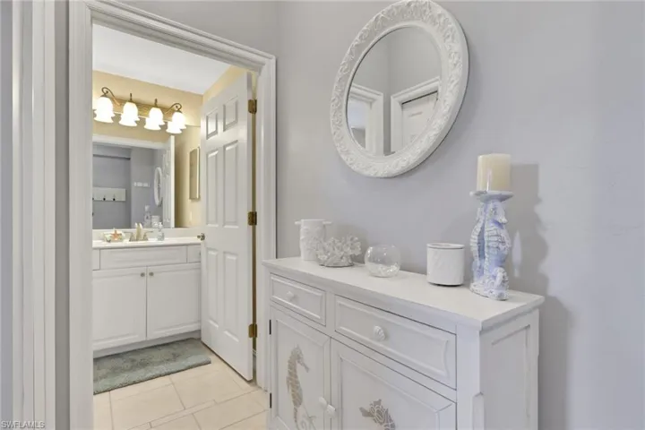 Bathroom with vanity and light tile patterned floors