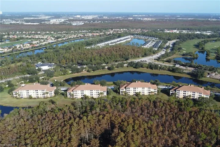 Aerial overview of property's location with a large body of water