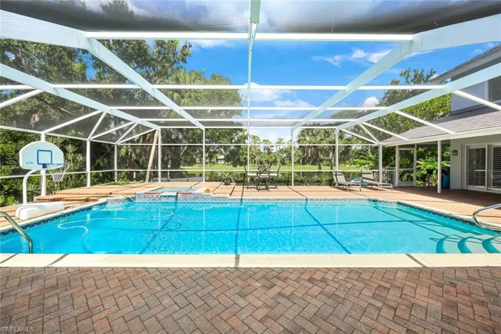 Expansive Pool, Ready for All Pool Games, Spill Over Spa, Large Paver Deck- Pool Cage