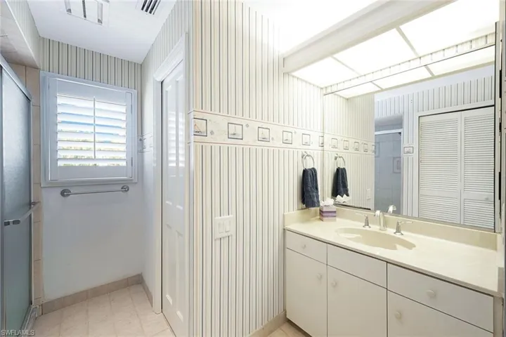 Second Floor Full Bath W/ Shower. Private Water Closet- Also Has Bi-Fold to a Second Laundry Area- Washer/Dryer