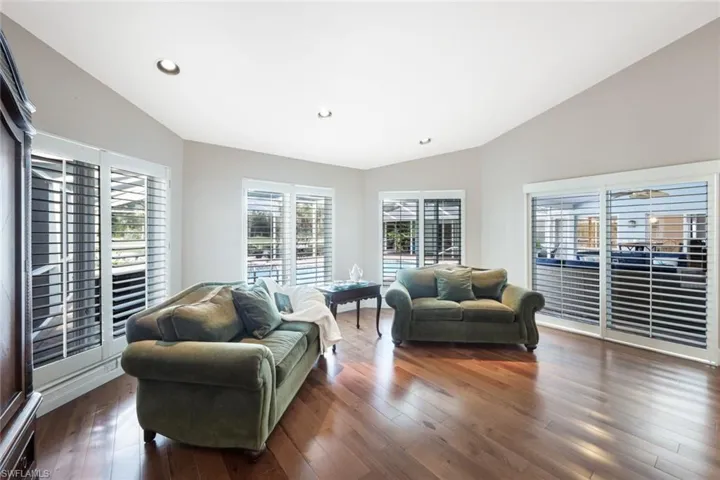 Primary Bedroom Sitting Area- Large Windows with Plantation Blinds