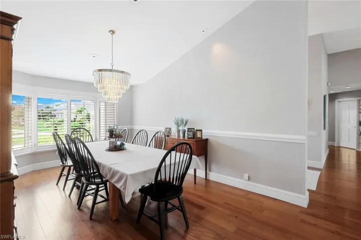 Spacious Dining Room Can Easily Accommodate a Long Dining Room Table- Plantation Blinds Throughout the Home.