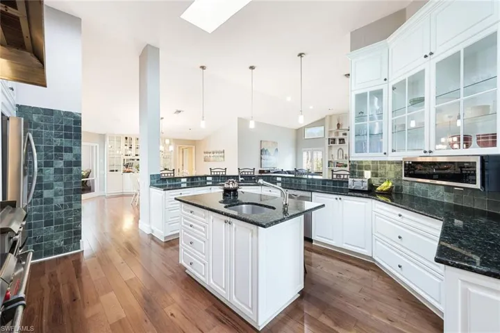 Two Refrigerators in This Home- In Kitchen is a French Style with Extra Pull Out Beverage Drawer