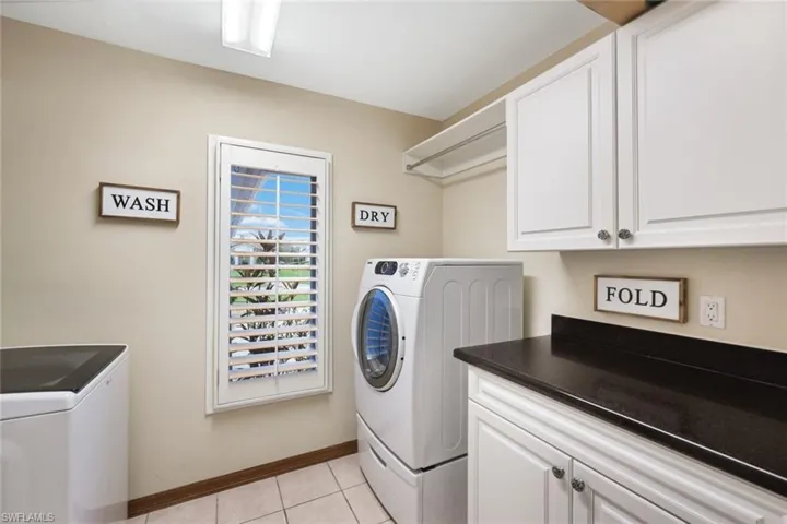 Downstairs Laundry Room With Folding Area (Storage not Shown), Tile Floor