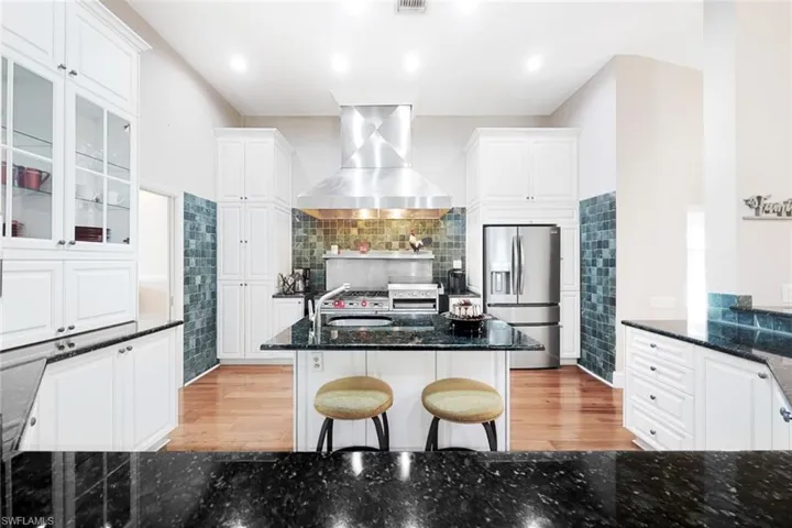 Kitchen Offers Two Sink Prep Areas, Center Island Also has Room for Little Helpers to Sit