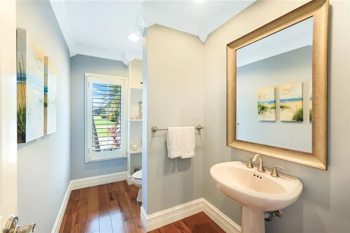 Large Powder Room Steps Away From The Den and Living Room