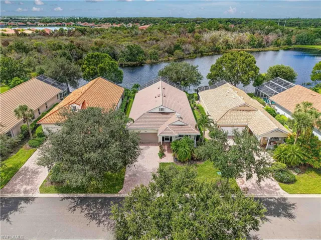 Aerial view of residential area with a nearby body of water