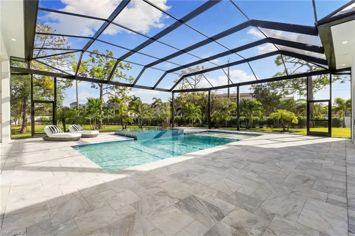 1.12 ACRES IN NAPLES’ HIGHLY COVETED PINE RIDGE ESTATES!