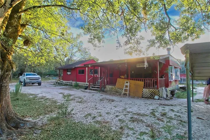 View of front of home with a deck