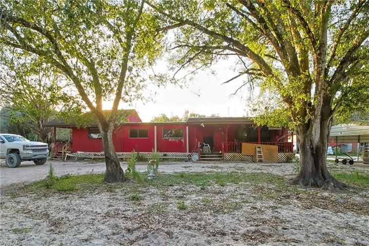 Single story home featuring a deck
