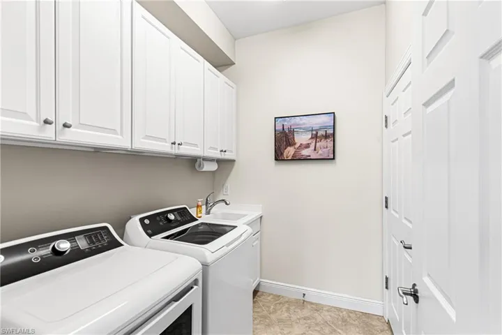 Laundry Room in Residence with Laundry Tub