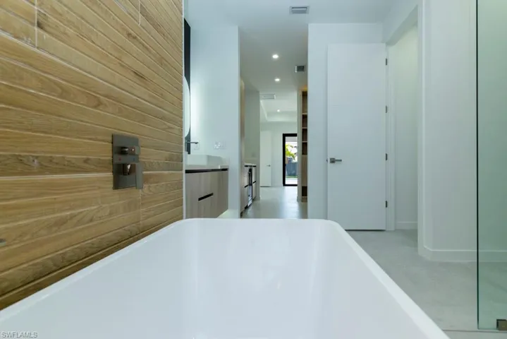 View of patio / terrace featuring exterior kitchen and ceiling fan