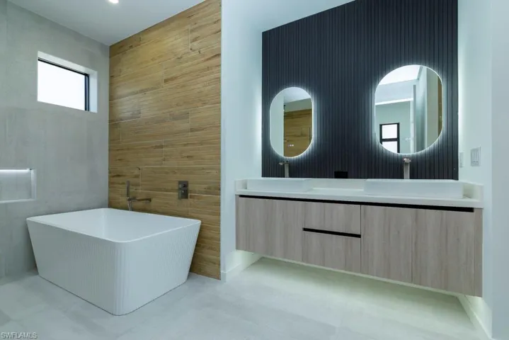 Full bath featuring vanity and toilet
