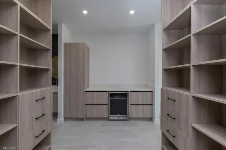 Spare room featuring concrete flooring, recessed lighting, and a ceiling fan